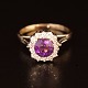 A brillant 
jewellery.
An amethyst 
ring set with 
14 brillant-cut 
diamonds 
mounted in 14k 
white ...