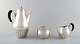 Johan Rohde for 
Georg Jensen. 
"Kosmos" coffee 
set in sterling 
silver with 
ebony handles. 
Dessin ...