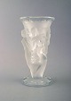 René Lalique 
"Bacchantes" 
vase in clear 
art glass 
decorated with 
dancing nymphs. 
1930's.
In ...