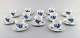 Royal Copenhagen. Set of twelve blue flower braided espresso cups with saucers. 
Number 10/8046.