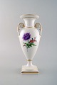 Meissen empire 
vase with hand 
painted floral 
motif. Ca. 
1920.
In very good 
...
