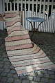 Old Swedish cloth rug in fine colors and good quality. Measures: 235x82cm.