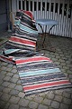 Old Swedish 
cloth rug in 
fine colors and 
good quality. 
Measures: 
480x82cm.