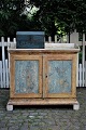 Swedish 19th 
century cabinet 
with gallery 
edge and stand 
in scraped 
original color 
with a super 
...