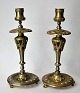 Pair of French 
bronze 
chandelliers, 
19th century 
Round foot. 
Adorned with 
plant 
ornaments. H.: 
...