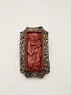 Brooch 4 x 2.4 
cm. lacquer 
surrounded by 
filigree Nr. 
372777