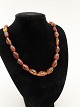 Necklace with 
olive cut amber 
pearls  50 cm. 
No. 373269