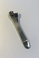 Hans Hansen 
Sterling 
Silver(Steel) 
Cigar Cutter 
Measures 14.5 
cm(5.70 
in)(Small 
engraving)