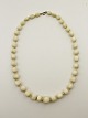 Ivory necklace 
63 cm.  # 
374190
