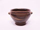 Ceramic bowl 
with handles 
and dark brown 
glaze from the 
1960s. The bowl 
is numbered 
410113.
H - ...