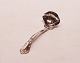 Small saucer in 
other pattern, 
stamped PAT 
1895, of 925 
sterling 
silver.
14 cm.