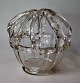 Bridal crown, 
clear glass, 
20th century 
Denmark. 
Height: 12.5 
cm. Diameter: 
12 cm.