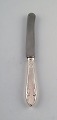 Danish silversmith. Lunch knife in silver (830).
