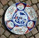 Large Japanese 
Imari dish, 
19/20. century. 
Polychrome 
decoration with 
flowers and 
birds. Signed. 
...