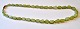 Light green 
jade necklace, 
20th century 
China. Length: 
51 cm. With 
gilded lock.