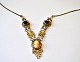 Norwegian 
necklace in 
filigree with 
glass and camè, 
19/20. century 
Length: 52 cm. 
Unstamped.