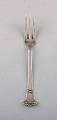 Danish silversmith. "Beaded" dinner fork in hammered silver (830). Dated 1925. 
Two pieces in stock.
