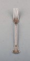 S. Chr. Fogh, 1912-1973. Danish silversmith. "Beaded" lunch fork in hammered 
silver (830). Dated 1957. Two pieces in stock.
