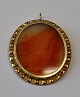 Agate pendant, 19th century. Mounted in gilt frame. Oval. 5 x 4.5 cm.Good condition!