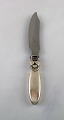 Early Georg Jensen "Cactus" knife in sterling silver and stainless steel. Dated 
1915-30.