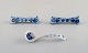 Two Stadt Meissen blue onion patterned knife rests and small spoon. Mid 20th 
century.
