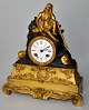 French matel clock in gilded bronze, approx. 1830. Decoration of young hiker with dog. With ...