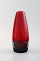 Per Lütken for Holmegaard. Sjælden hyggelampe til stearinlys i sort og rødt 
kunstglas. Designet i 1958.