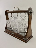 English tantalus with three decanters