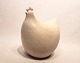 White ceramic sculpture in the shape of a hen by the french artist Marilyn 
Vergne.
5000m2 showroom.
