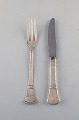 Middagskniv og gaffel i tretårnet sølv. 1920
