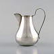 Antique English silver jug. Late 19th century.

