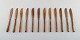 Sigvard 
Bernadotte 
'Scanline' 
cutlery in 
brass. Set of 
twelve fruit 
knives.
In very good 
...