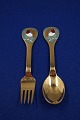Michelsen set Christmas spoon and fork 1981 of 
Danish gilt sterling silver