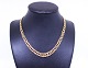 Bismark 
necklace of 18 
carat gold and 
stamped CGAB.
42 cm and 30 
g.
