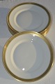 Royal Porcelain 
Royal 
Copenhagen  No. 
607. White 
porcelain with 
wide gold rim. 
Plate No. ...