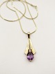 14 carat gold 
necklace 50 cm. 
and pendant 4.5 
x 1.7 cm. with 
amethyst No. 
381579