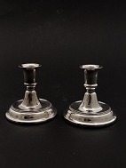 A pair of 830s silver candlesticks