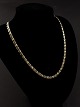 14 carat white 
and red gold 
necklace length 
45 cm. width 
0.5 cm.  19.1 
gr. no. 381946