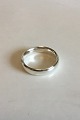 Georg Jensen 
Sterling sølv 
Armbånd 
designet af 
Hans Hansen. 
Måler 7,4 cm 
dia. x 1,6 cm 
bredt. ...