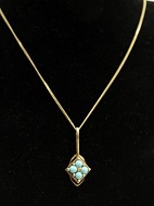 14 carat gold necklace 42 cm. and pendant with turquoise. 