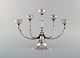 Harald Nielsen for Georg Jensen. Art deco "Pyramid" candelabra in sterling 
silver. Dated 1933-44. Design 537A.