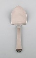 Rare and early Georg Jensen "Pyramid" serving spade in silver. Dated 1915-30.