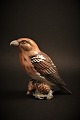 Dahl Jensen 
porcelain 
figure of the 
bird, 
Crossbill. 
H:10.5 cm. 
Decoration 
number: ...