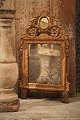 Decorative, French 1800 Century mirror with fine decorated frame with old gilding and a super ...