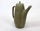 Ceramic jug with dark green glaze by Palshus and numbered, 1187.
5000m2 showroom.