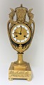 Very well kept 
French Empire 
vase shaped 
mantle clock of 
gilt and 
patinated 
bronze. Height 
43 ...