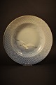 Bing & Grondahl 
deep plate in 
Seagull with 
gold edge. 
Decoration 
number: 23. 
Dia.:21cm.
In ...