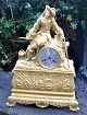 French gilt bronze mantel clock, approx. 1820. Top figure in the form of general. Silver plated ...