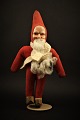 Old Santa Claus 
from the 50s in 
fabric with 
face in 
celluloid. 
Height: 29cm.