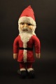 Old Santa Claus 
Santa Claus in 
fabric with 
celluloid face.
Height: 33cm.
